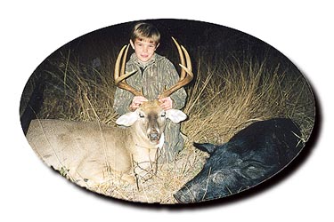 Junior hunter with deer and javelina